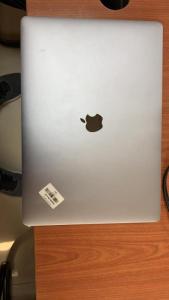 MacBook Pro .6 inch Touch Bar cor i7 ram 16 gb little used no scratches warranty 3 month -