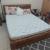 Queen bed with side table -