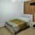 Master Bedroom With Window, Big Wardrobe, And Attached Bathroom - UAE